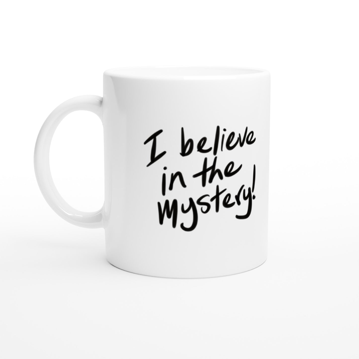 'I believe in the Mystery!' Black on white White 11oz Ceramic Mug